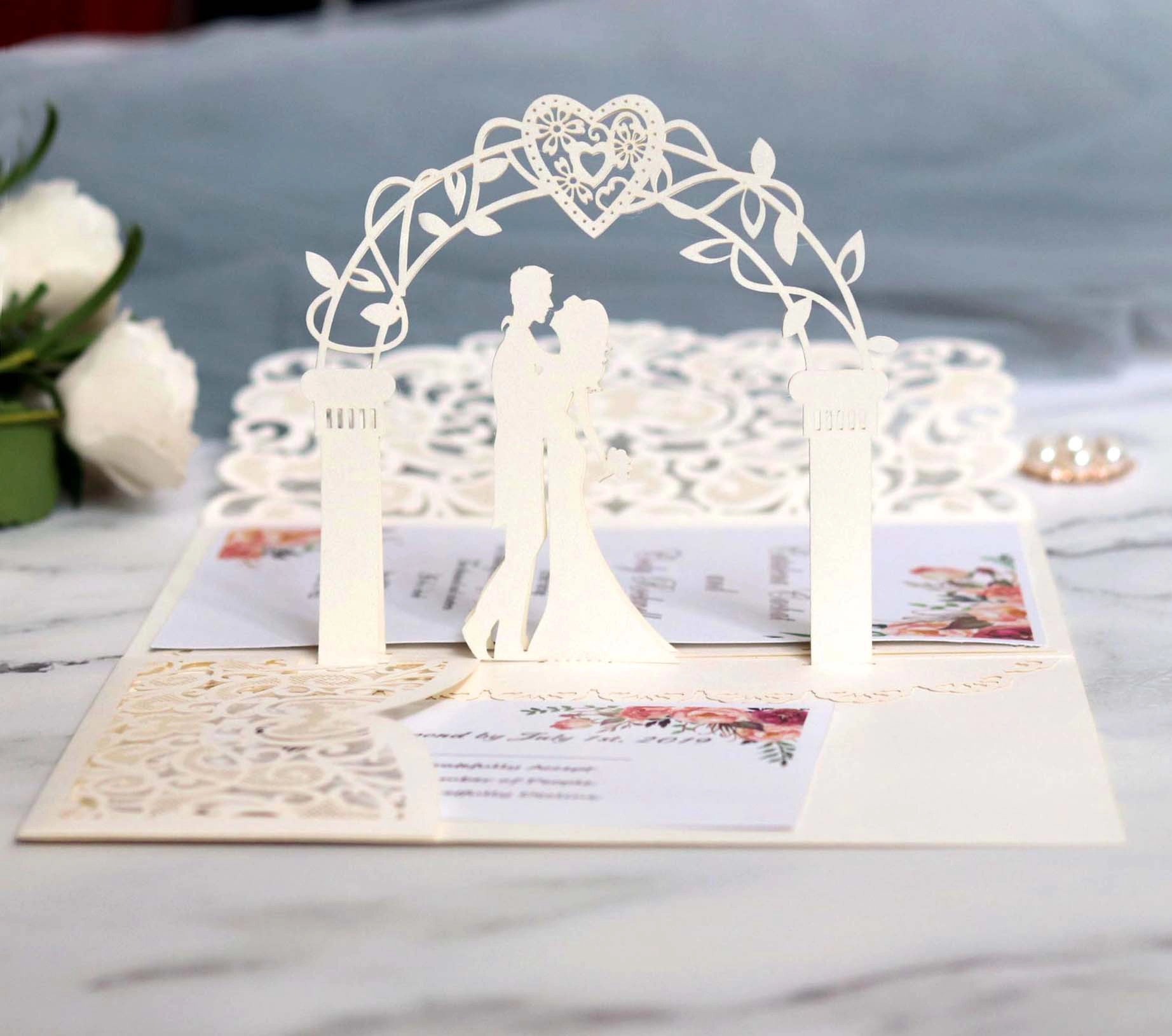Elegant ivory 3D laser-cut pop-up wedding invitation with bride and groom silhouette
