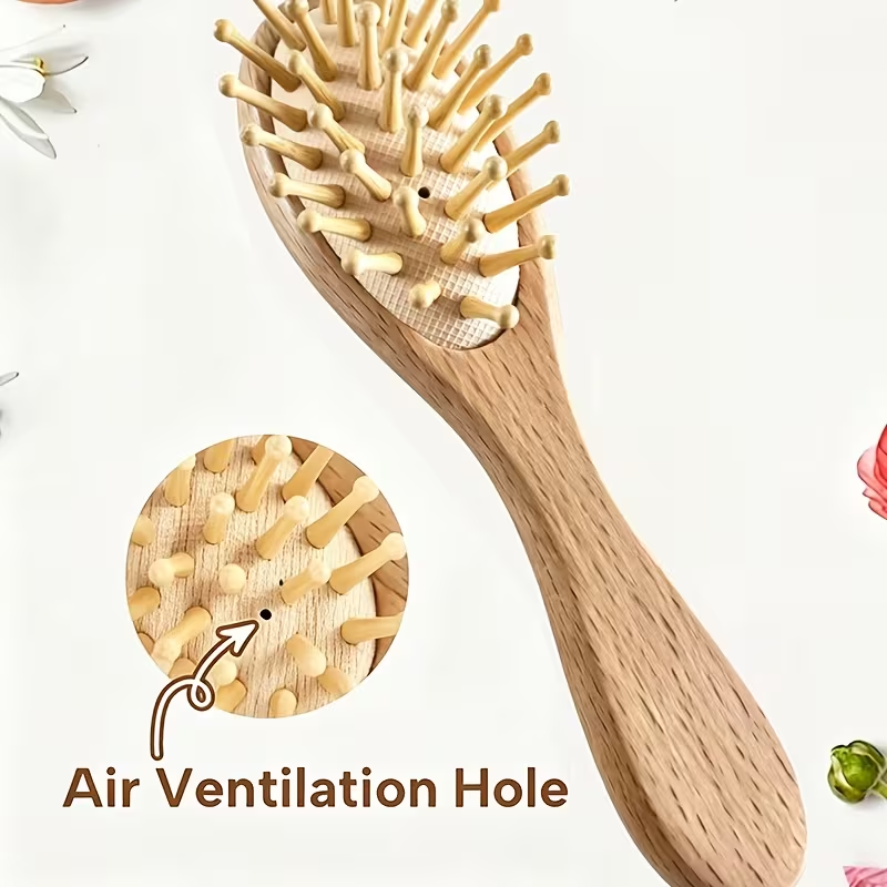 Personalized 3-piece wooden baby brush and comb set with air ventilation detail